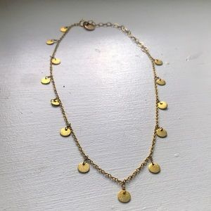 Gold charmed necklace